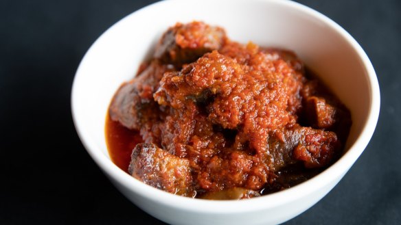 Goat stew is a thick, aromatic jumble fruity with capsicum and sweet with tomatoes, onion and warm with spices.