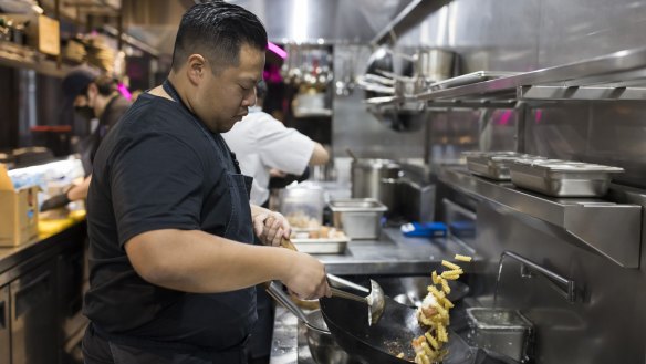 Chef Brendan Fong on the pans at his restaurant Lilymu in Parramatta, Sydney.