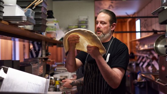 Chef and co-owner Paul Kasten makes three different doughs for each style.
