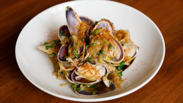 Steamed pipis with garlic, anchovies chilli and slow-cooked onion. 