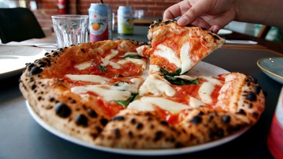 Puffy-crusted margherita pizza at Shop 225.