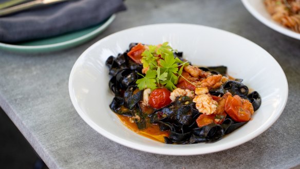 Go-to dish: Squid ink fettuccine with crab, cherry tomatoes and chilli.