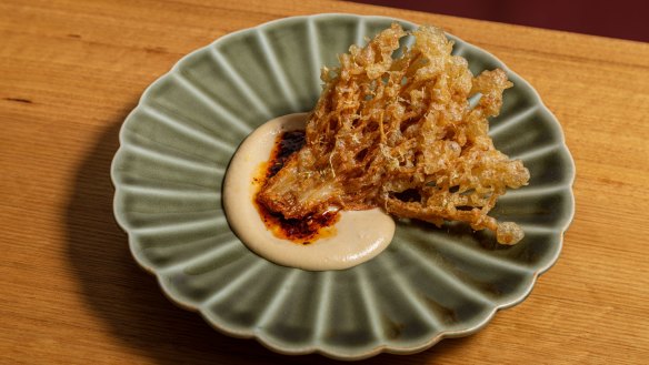 Tempura enoki mushroom with almond tarator and chilli oil.