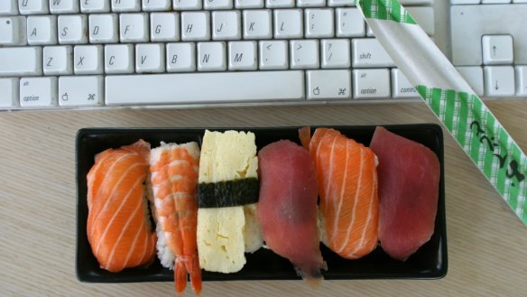 Many people buy lunch to eat at their desk.