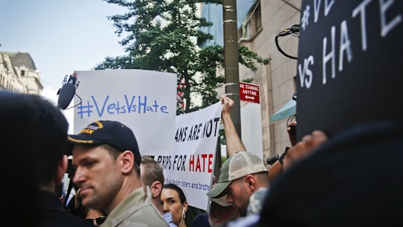 Army veteran Perry O'Brien with protesting veterans, outside the Trump news conference. "I think Donald Trump clearly thinks the veteran community is for sale," said O'Brien.