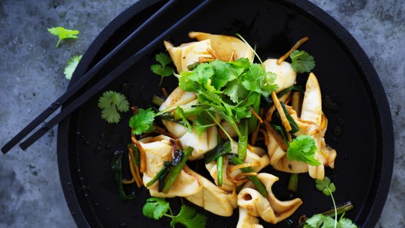 Stir-fried squid with ginger and spring onion.