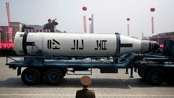 A submarine missile is paraded across Kim Il-sung Square during a military parade in Pyongyang, North Korea on Saturday.