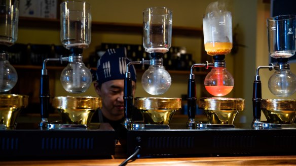 Bonito broth being made in a siphon.