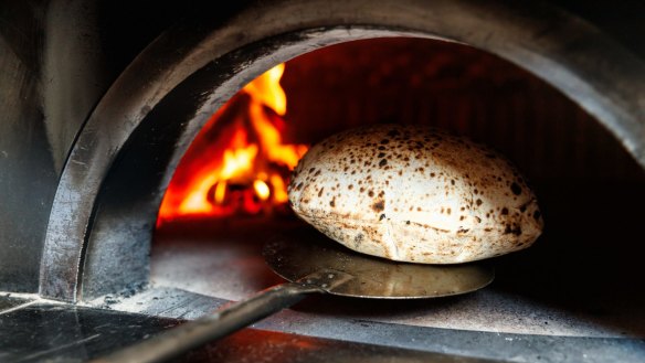 Wood-fire bread is a cornerstone of the menu.