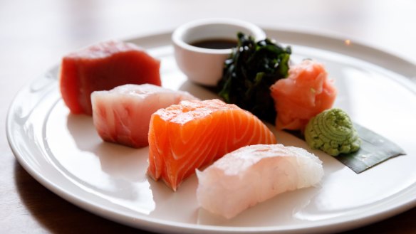 Sashimi of tuna, snapper, king fish and salmon. 