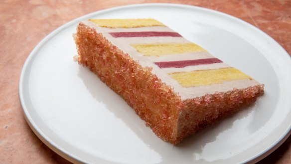 Arc Dining's peach melba cake iced with finger limes