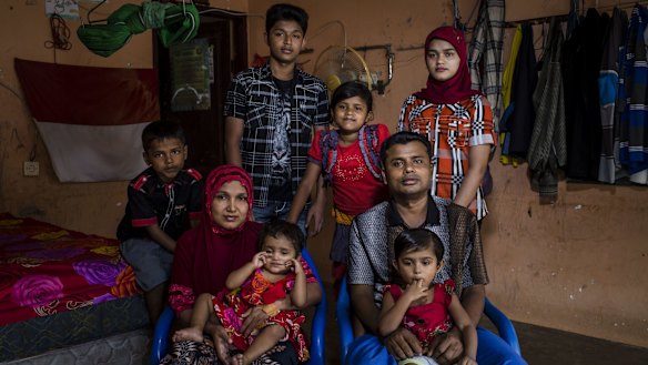 A Rohingya refugee family Muhammad Rofiq, mother Hamidah and their children in a refugee camp in Medan, North Sumatra, Indonesia. 