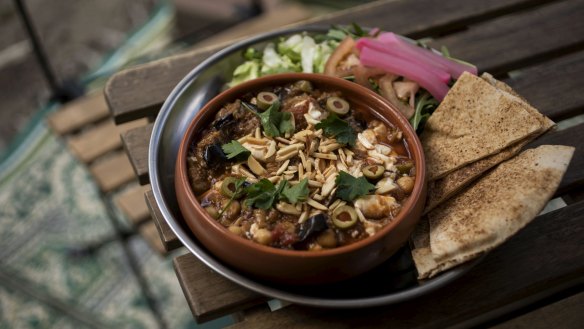 The tomato-rich shakshuka comes with tofu instead of eggs.