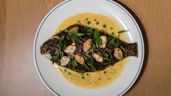 Whole kelp flounder with pickled mussels, warrigal greens and aniseed myrtle.