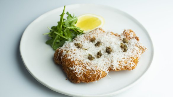 Chicken alla Milanese: parmesan and herb-crumbed chicken schnitzel with capers. 