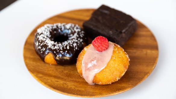 Sweet potato brownie (rear), raspberry custard and lamington-flavoured doughnuts.