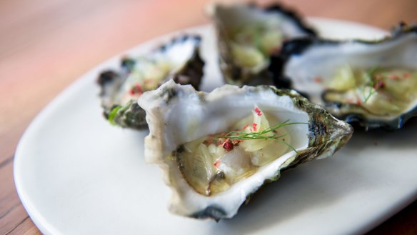 Moonlight Flat oysters with pomello and pink peppercorn. 