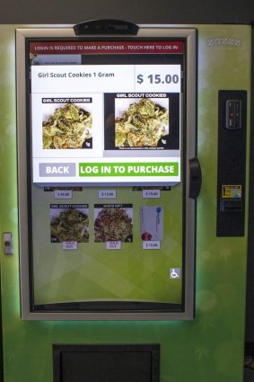 A vending machine that contains cannabis flower, hemp-oil energy drinks, and other merchandise at Seattle Caregivers, a medical marijuana dispensary, in Seattle.