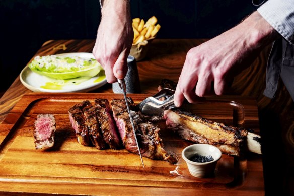 Collinson & Co grass-fed tomahawk steak with chips.