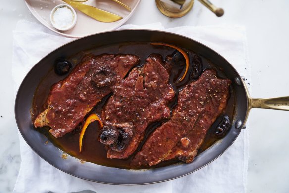 Braised brisket with prunes and bacon.
