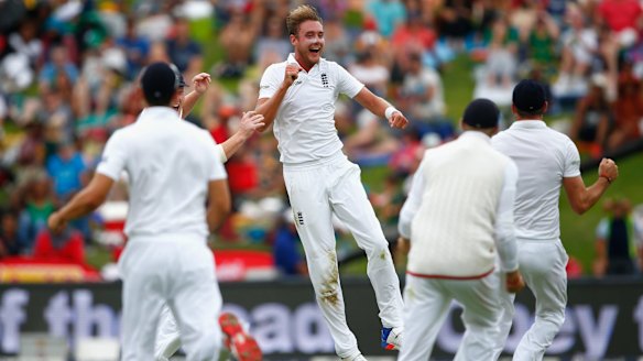 Broad celebrates after taking the wicket of De Villiers.
