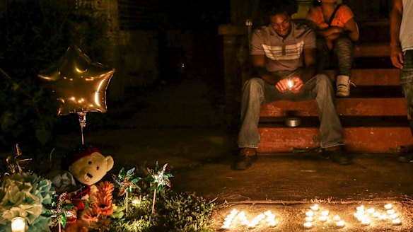 St Louis teenager whose death sparked protests was shot in the back by ...