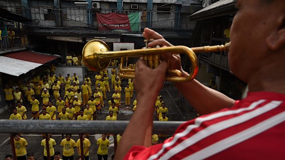 Inmates go through their morning routine at Quezon city jail.