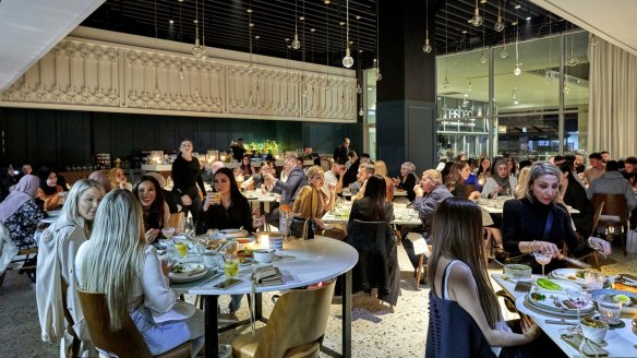 Tables are positively assaulted with share plates at Bayti in Parramatta.