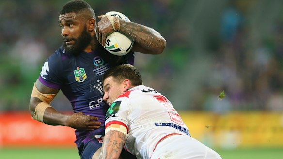 Try machine: Marika Koroibete is driven back by Josh Dugan.