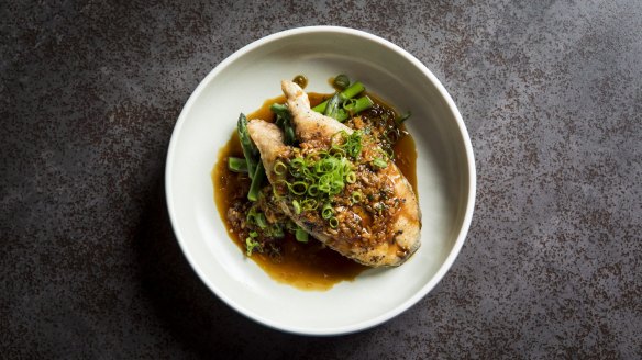 Pan-fried Spanish mackerel with fermented sticky rice sauce.