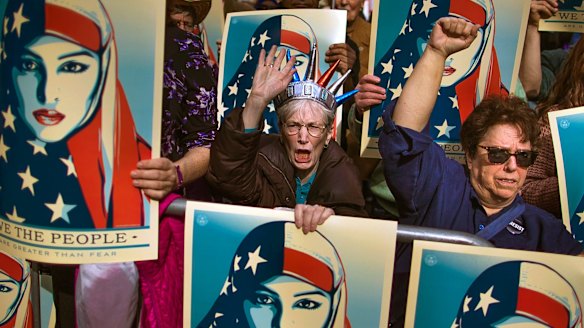 People protest against the original ban in February. 