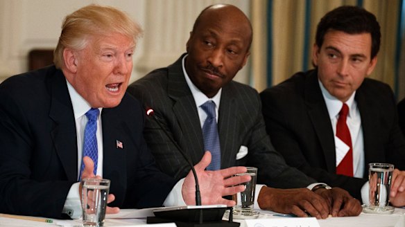 Trump, left,meeting with manufacturing executives in February, including Kenneth Frazier, centre.