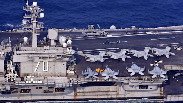 The USS Carl Vinson sails off  Nagasaki prefecture, southern Japan, on Saturday.