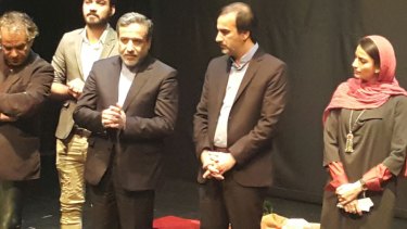 Iran's Deputy Foreign Minister Abbas Araghchi (third from left) with actors and producers.