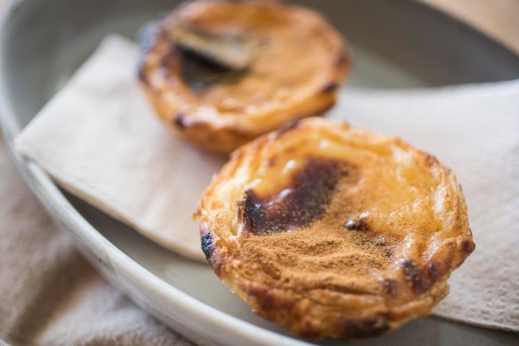 CInnamon and sugar crusted custard tarts.