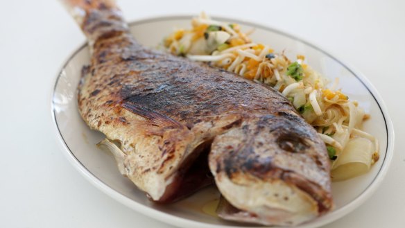 Whole snapper with green papaya salad. 