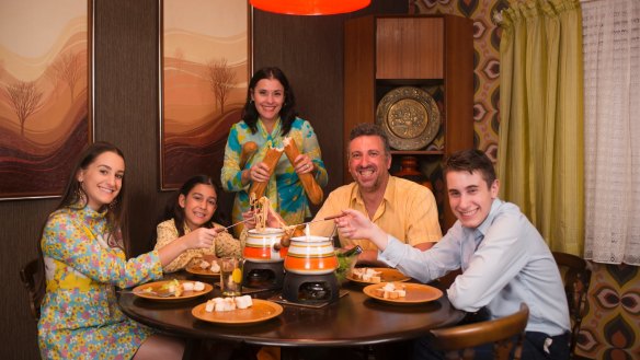 The Ferrone family enjoying fondue in their 1970s house.