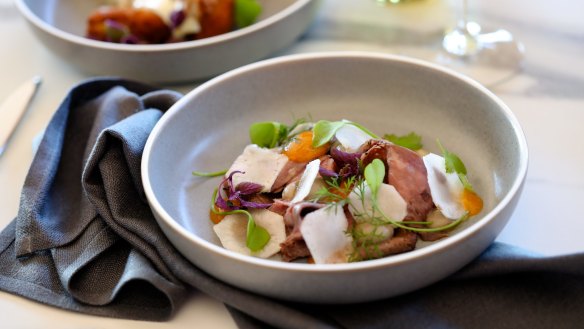 Beef brisket, Jerusalem artichokes, egg yolk and mustard leaves.