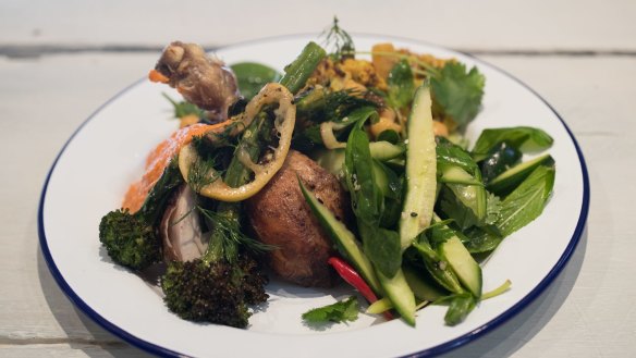 Go-to dish: Wood roasted chicken with broccolini and romesco.