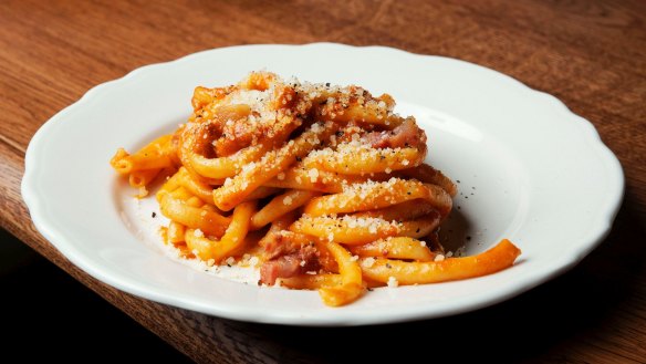 Pasta is done with care and depth; notably this Roman bucatini all'amatriciana.