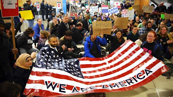 Sit down: A demonstration against Donald Trump's executive order on immigration at Seattle-Tacoma International Airport.