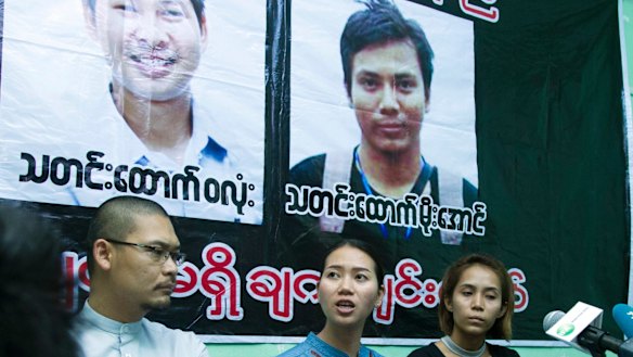 Pan Ei Mon, centre, wife of  Wa Lone, talks to journalists during a press briefing with Nyo Nyo Aye, right, sister of Moe Aung, and Zeyar Hlaing on December 28.