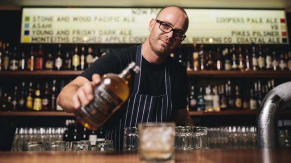 Nick Parkinson behind the bar.