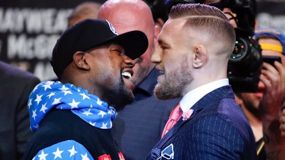 Fighters Floyd Mayweather jnr and Conor McGregor get up close and personal.