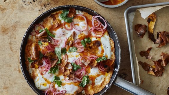 Sweet potato shakshuka with sriracha butter and pickled onions.