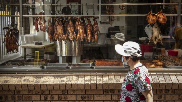 A local window shops at Tan Hong Phat BBQ in Cabramatta.