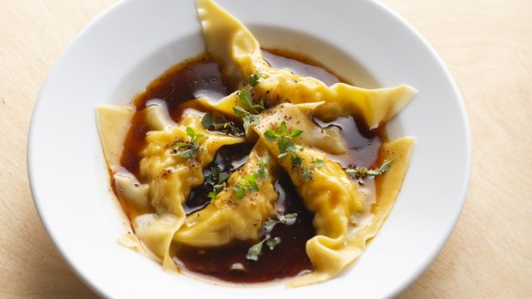 Steamed prawn dumplings with Sichuan chilli and Jiwah native bush mint.