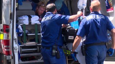 A woman was taken to hospital in a serious condition after falling unconscious at The Cosmetic Institute Parramatta in Sydney's west.