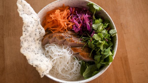 Vietnamese noodle salad with duck, rice cracker and fermented chilli dressing. 