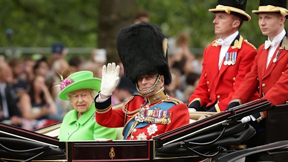 Queen Elizabeth and the Duke of Edinburgh makes their way  from Buckingham Palace for the Trooping the Colour ceremony last year.